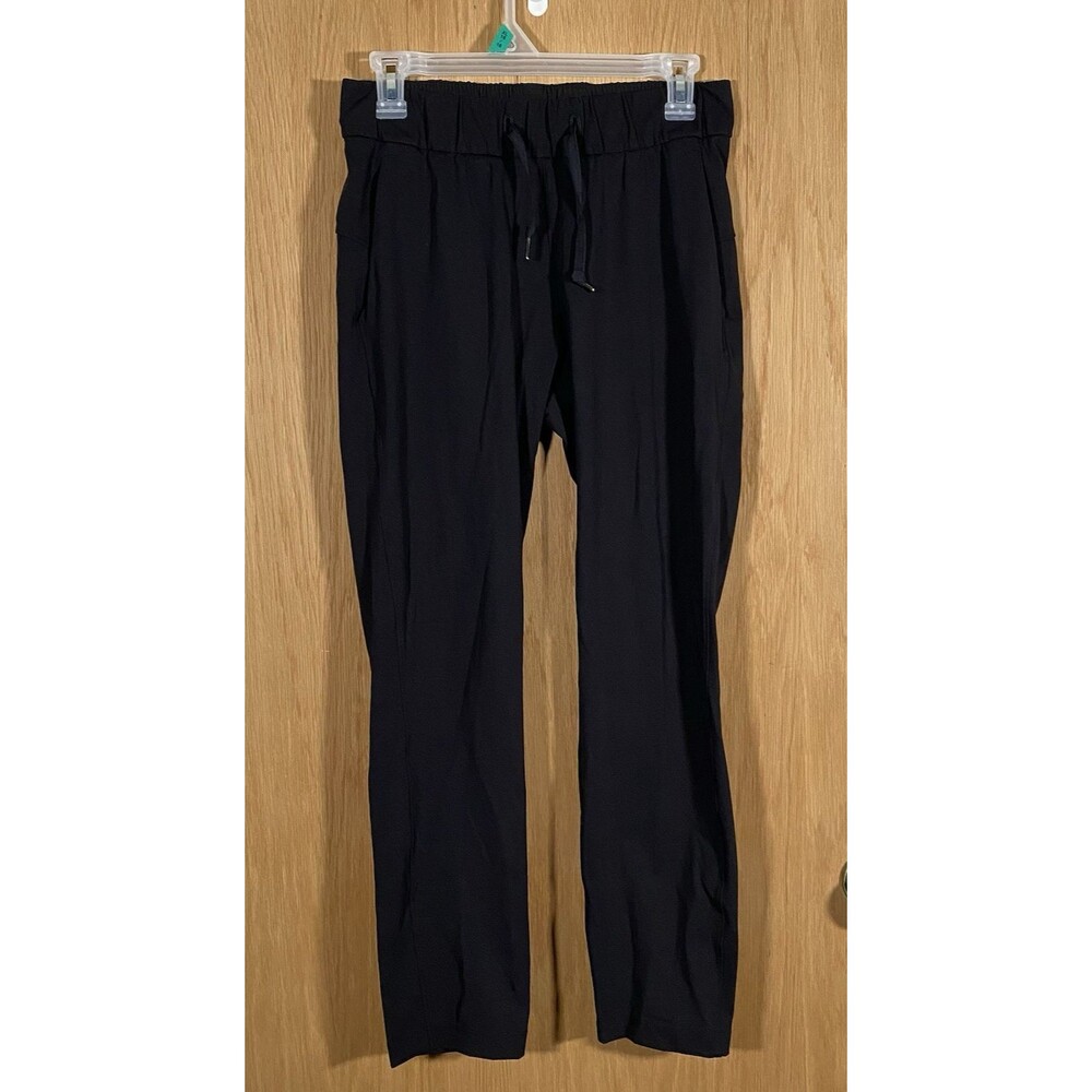 Lululemon Sz 4 On The Fly Pant Woven 27 Black Pants Joggers Pockets Athleisure